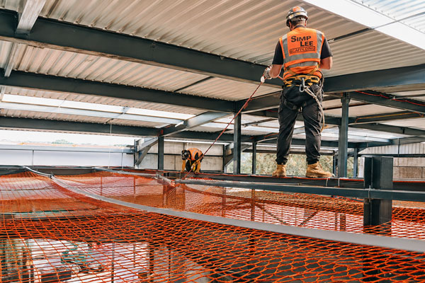 Commercial roof safety netting installed below high-level work in Essex