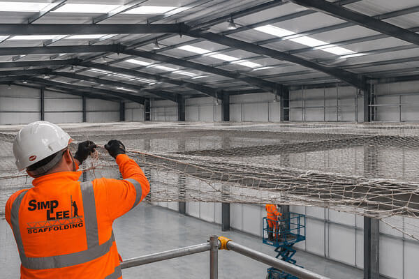 Industrial safety netting installed inside a commercial unit